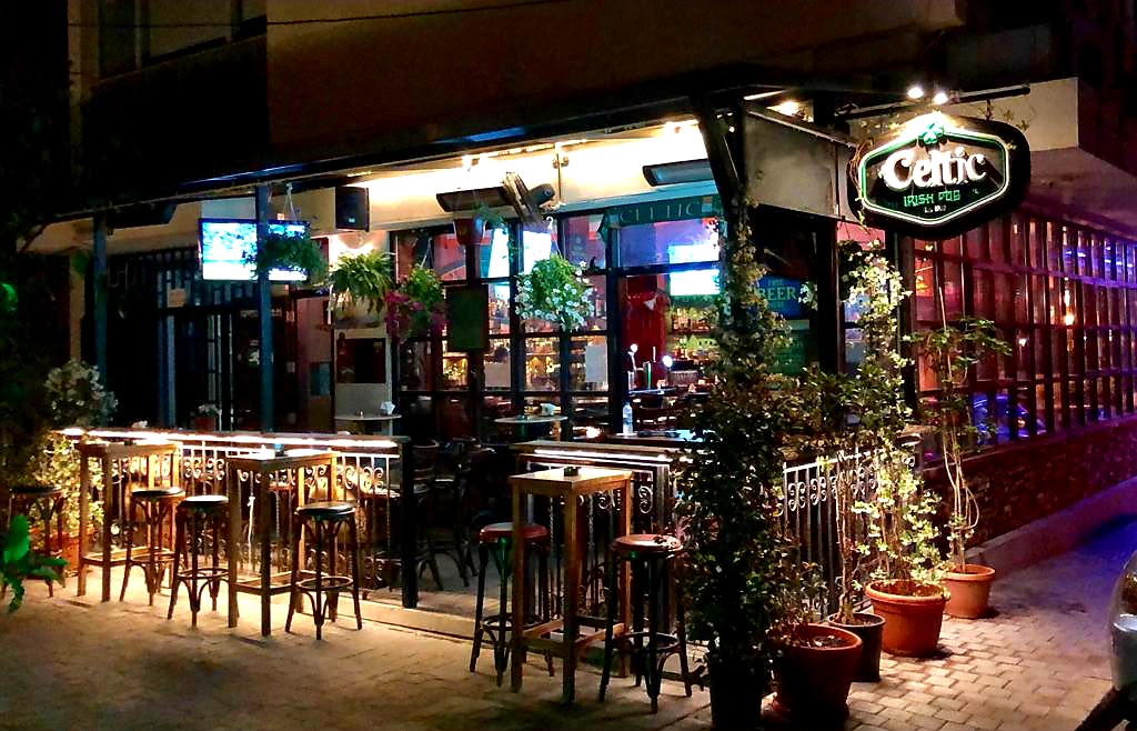 Outdoor terrace and entrance of Celtic Irish Bar on Monot Street