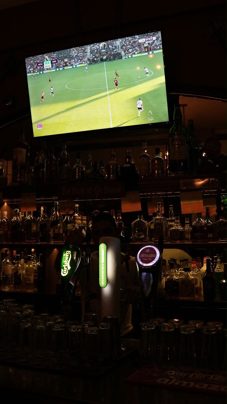 Live football shown above the bar at Celtic Irish Bar